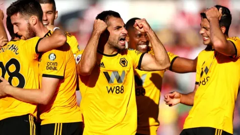 Foto de los jugadores celebrando un gol.