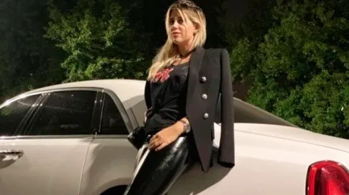 Wanda, encima de su Rolls Royce.