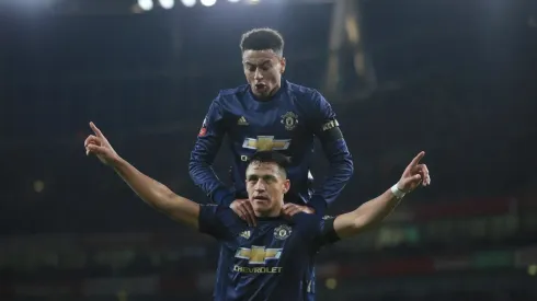 Alexis Sánchez y Jesse Lingard (Foto: Getty)