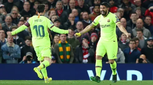 Messi y Suárez festejan el gol que abrió el marcador.