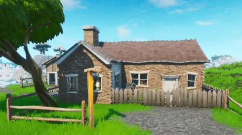 Busca entre un teléfono de disco, un cubierto y en una casa en la cima de una colina llena de posters de Carburo y Omega en Fortnite