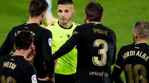 Foto de Lionel Messi con Gerard Piqué en Barcelona.