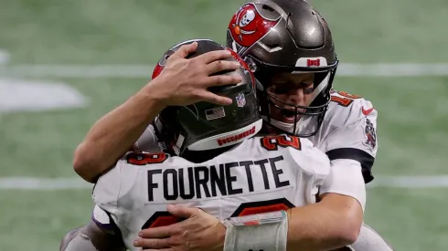 Leonard Fournette y Tom Brady