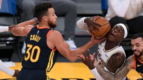 Stephen Curry y Dennis Schroeder