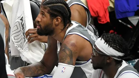 Paul George y Reggie Jackson.