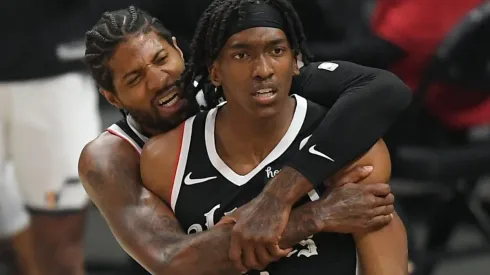 Paul George y Terrence Mann