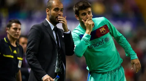 Pep Guardiola y Gerard Piqué en Barcelona en 2011.