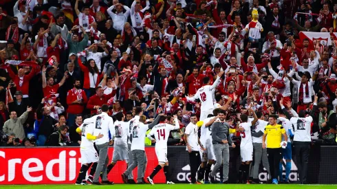 BASEL, SWITZERLAND – MAY 18: Sevilla players celebrate their 3-1 win in front of their supporters after the UEFA Europa League Final matach between Liverpool and Sevilla at St. Jakob-Park on May 18, 2016 in Basel, Basel-Stadt. (Photo by David Ramos/Getty Images)