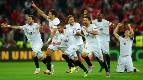 TURIN, ITALY - MAY 14: Sevilla players celebrate after Kevin Gameiro of Sevilla scores the winning penalty in the shoot out during the UEFA Europa League Final match between Sevilla FC and SL Benfica at Juventus Stadium on May 14, 2014 in Turin, Italy. (Photo by Jamie McDonald/Getty Images)