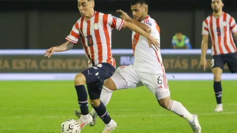 CIUDAD DEL ESTE, PARAGUAY - SEPTEMBER 07: Miguel Almiron of Paraguay battles for possession with Miguel Trauco of Peru during a FIFA World Cup 2026 Qualifier match between Paraguay and Peru at Antonio Aranda Stadium on September 07, 2023 in Ciudad del Este, Paraguay. (Photo by Christian Alvarenga/Getty Images)