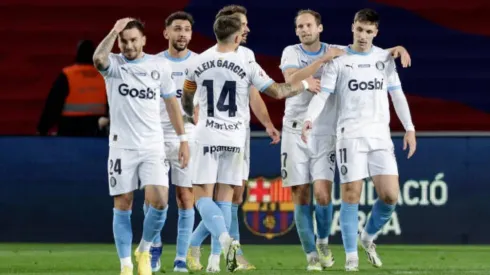 Los jugadores del Girona festejan su triunfo en Barcelona por 2-4.