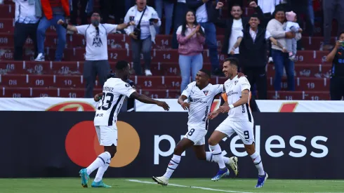 QUITO, ECUADOR - APRIL 11: Lizandro Alzugaray (R) of Liga de Quito celebrates with teammates Leonel Quiñónez (L) and Luis Estupiñán after scoring the team's first goal during a Copa CONMEBOL Libertadores match between LDU Quito and Botafogo at Rodrigo Paz Delgado Stadium on April 11, 2024 in Quito, Ecuador. (Photo by Franklin Jacome/Getty Images)