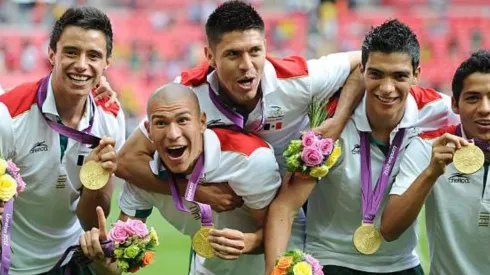 Rodríguez, Enríquez, Peralta, Jiménez y Aquino con el oro de Londres 2012.