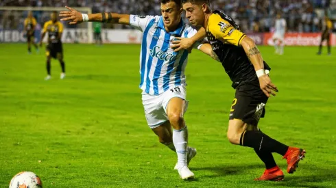 Augusto Lotti, a la izquierda, con el Atlético Tucumán.