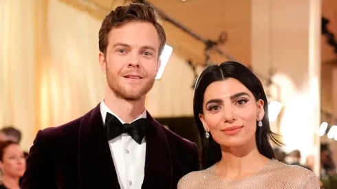 Jack Quaid and Claudia Doumit attend the 96th Annual Academy Awards on March 10, 2024 in Hollywood, California.