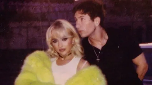 Sabrina Carpenter and Barry Keoghan behind the scenes of the music video “Please Please Please”.