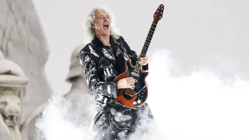LONDON, ENGLAND – JUNE 04: Brian May of Queen performs during the Platinum Party At The Palace at Buckingham Palace on June 4, 2022 in London, England. The Platinum Jubilee of Elizabeth II is being celebrated from June 2 to June 5, 2022, in the UK and Commonwealth to mark the 70th anniversary of the accession of Queen Elizabeth II on 6 February 1952. (Photo by Alberto Pezzali – WPA Pool/Getty Images)