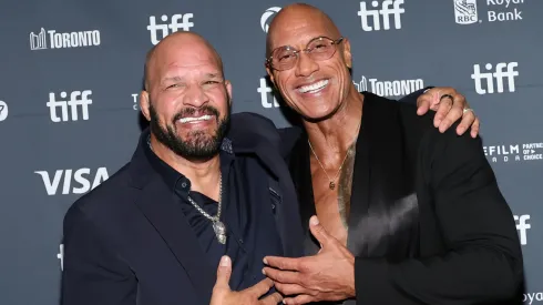 Mark Kerr and Dwayne Johnson attend the premiere of "The Smashing Machine" in 2025.