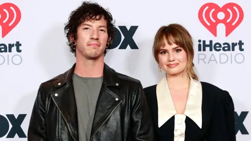 Josh Dun of music group Twenty One Pilots and Debby Ryan attend the 2021 iHeartRadio Music Awards at The Dolby Theatre in Los Angeles, California, which was broadcast live on FOX on May 27, 2021. (Photo by Emma McIntyre/Getty Images for iHeartMedia)