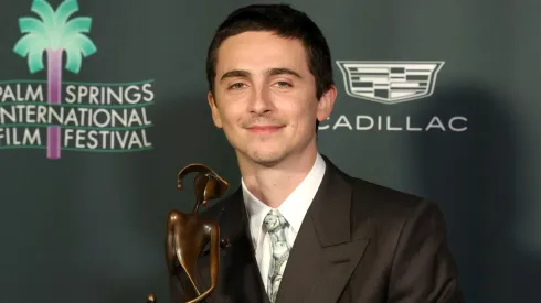 Timothée Chalamet poses with the Spotlight Award for "Marty Supreme" in the press room during the 37th Annual Palm Springs International Film Festival Film Awards at Palm Springs Convention Center on January 03, 2026 in Palm Springs, California.