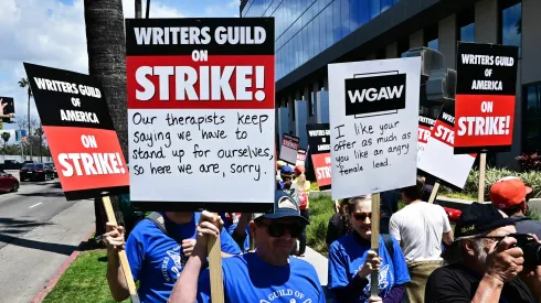 Writers picket in front of Netflix on Sunset Boulevard in Hollywood, California, on May 2, 2023 as the Writers Guild of America (WGA) goes on strike. – More than 11,000 Hollywood television and movie writers went on their first strike in 15 years, after talks with studios and streamers over pay and working conditions failed to clinch a deal. The strike means late-night shows are expected to grind to a halt immediately, while television series and movies scheduled for release later this year and beyond could face major delays. (Photo by Frederic J. BROWN / AFP) (Photo by FREDERIC J. BROWN/AFP via Getty Images)
