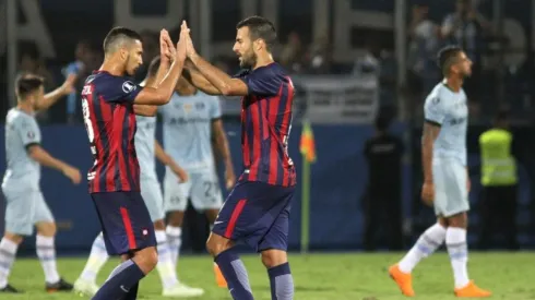 Juan Escobar junto a Raúl Cáceres.