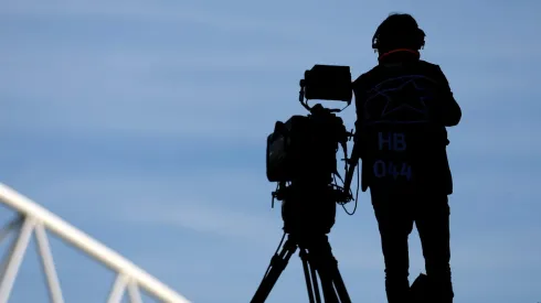 PORTO, PORTUGAL – MARCH 14: A TV camera operator is seen prior to the UEFA Champions League round of 16 leg two match between FC Porto and FC Internazionale at Estadio do Dragao on March 14, 2023 in Porto, Portugal. (Photo by Alex Pantling/Getty Images)