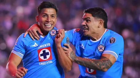 MEXICO CITY, MEXICO – NOVEMBER 30: Angel Sepulveda of Cruz Azul celebrates with teammate after scoring the team's third goal during the quarterfinals second leg match between Cruz Azul and Tijuana as part of the Torneo Apertura 2024 Liga MX at Estadio Ciudad de los Deportes on November 30, 2024 in Mexico City, Mexico. (Photo by Hector Vivas/Getty Images)
