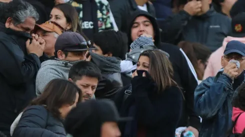 Hinchas bajos los efectos del gas pimienta