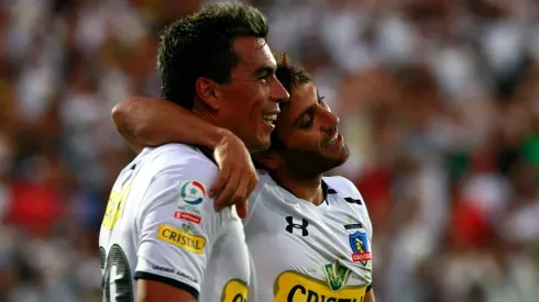 Olivi celebrando un gol junto a Paredes el 2014