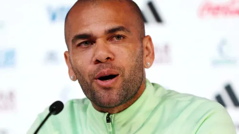 DOHA, QATAR - DECEMBER 01: Dani Alves of Brazil speaks during the Brazil Press Conference at the Main Media Center on December 01, 2022 in Doha, Qatar. (Photo by Mohamed Farag/Getty Images)