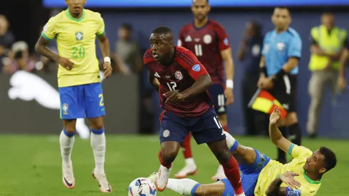 INGLEWOOD, CALIFORNIA - JUNE 24: Joel Campbell of Costa Rica challenges for the ball with Danilo of Brazil during the CONMEBOL Copa America 2024 Group D match between Brazil and Costa Rica at SoFi Stadium on June 24, 2024 in Inglewood, California. (Photo by Buda Mendes/Getty Images)