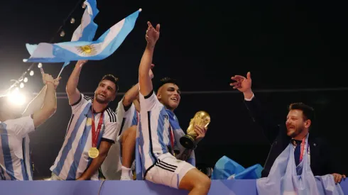 LUSAIL CITY, QATAR – DECEMBER 18: Nicolas Tagliafico and Lautaro Martinez of Argentina celebrate after winning the FIFA World Cup on an open top bus outside the stadium after the FIFA World Cup Qatar 2022 Final match between Argentina and France at Lusail Stadium on December 18, 2022 in Lusail City, Qatar. (Photo by Mohamed Farag/Getty Images)
