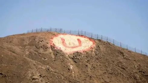 Hinchas de Alianza Lima pintan la insignia de Universitario