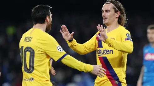 Griezmann festeja junto a Messi el empate ante el Nápoli