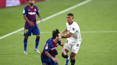 Messi y Vidal ante un duro Sevilla.