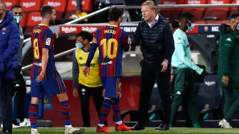 Koeman junto a Lionel Messi
