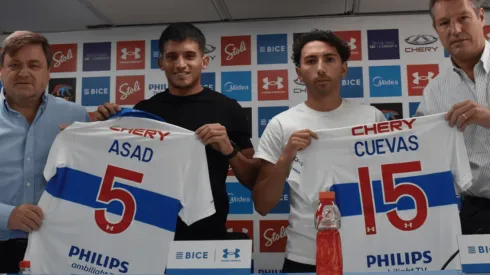 Cuevas y Asad con la camiseta de la UC