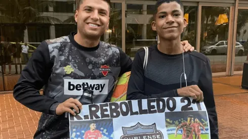 Raimundo Rebolledo junto a hincha brasileño fanático suyo.