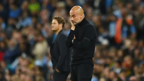 MANCHESTER, ENGLAND – SEPTEMBER 14: Pep Guardiola, Manager of Manchester City looks dejected during the UEFA Champions League group G match between Manchester City and Borussia Dortmund at Etihad Stadium on September 14, 2022 in Manchester, England. (Photo by Michael Regan/Getty Images)