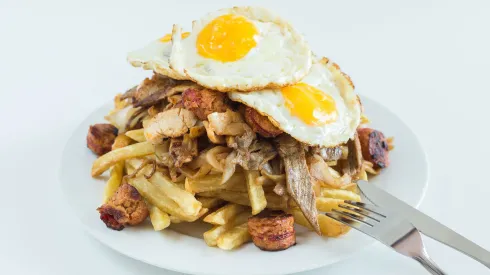 Chorrillana,  french  fries,  fried  onion,  sausages  and  fried  eggs  with  white  background xkwx chorrillana,  lunch,  unhealthy,  fatty,  fry,  tasty,  orange,  dish,  chilean,  french,  sausage,  crunchy,  food,  egg,  fries,  taste,  yellow,  potatoes,  breakfast,  chips,  plate,  fat,  french  fries,  eggs,  fastfood,  onion,  sausages,  white,  background,  dig,  launch