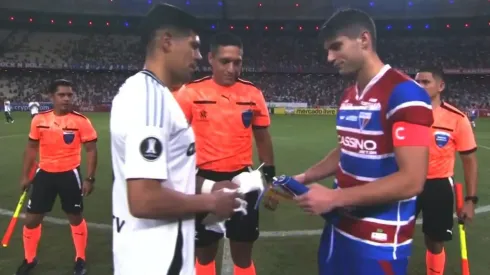 Esteban Pavez y Benjamín Kuscevic en el sorteo de capitanes.