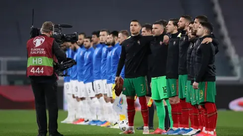 TURIN, ITALY - MARCH 24: The steadycam tv camera passes by as Cristiano Ronaldo of Portugal sings the national anthem along with team mates during the FIFA World Cup 2022 Qatar qualifying match between Portugal and Azerbaijan at Allianz Stadium on March 24, 2021 in Turin, Italy. (Photo by Jonathan Moscrop/Getty Images)