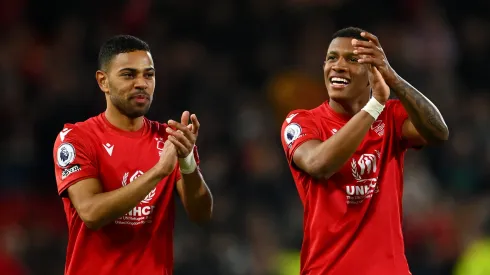 NOTTINGHAM, ENGLAND - APRIL 26: Renan Lodi and Danilo of Nottingham Forest applaud the fans following the Premier League match between Nottingham Forest and Brighton & Hove Albion at City Ground on April 26, 2023 in Nottingham, England. (Photo by Clive Mason/Getty Images)