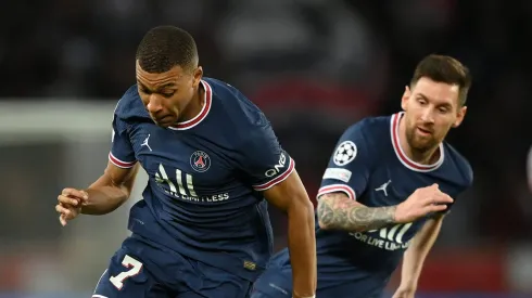 Kylian Mbappe and Lionel Messi . (Photo by Matthias Hangst/Getty Images)