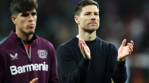 LEVERKUSEN, GERMANY - MARCH 14: Xabi Alonso, Head Coach of Bayer Leverkusen, applauds the fans following the team's victory during the UEFA Europa League 2023/24 round of 16 second leg match between Bayer 04 Leverkusen and Qarabag FK at BayArena on March 14, 2024 in Leverkusen, Germany. (Photo by Alex Grimm/Getty Images)