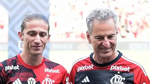 Filipe Luis e Rodolfo Landim lado a lado