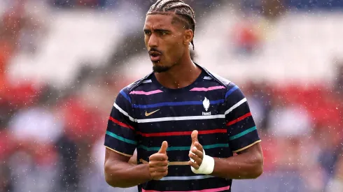 PARIS, FRANCE - AUGUST 09: Loic Bade #4 of Team France warms up prior to the Men's Gold Medal match between France and Spain during the Olympic Games Paris 2024 at Parc des Princes on August 09, 2024 in Paris, France. (Photo by Robert Cianflone/Getty Images)