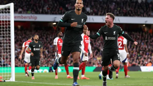 LONDON, ENGLAND – OCTOBER 27: Virgil van Dijk of Liverpool celebrates scoring his team's first goal with Alexis Mac Allister during the Premier League match between Arsenal FC and Liverpool FC at Emirates Stadium on October 27, 2024 in London, England. (Photo by Alex Pantling/Getty Images)