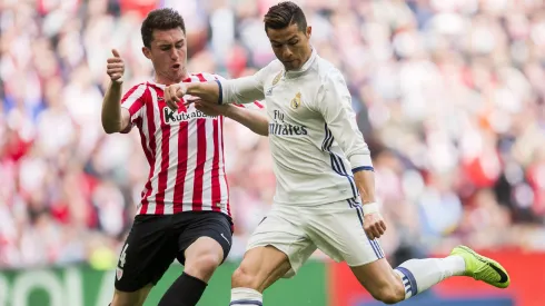 Cristiano Ronaldo e Aymeric Laporte em ação na La Liga.